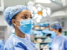 nurse check monitor in the OR