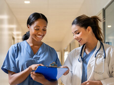 Nurse and doctor coordinating