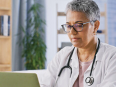 doctor on laptop