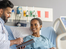 Doctor speaking with patient