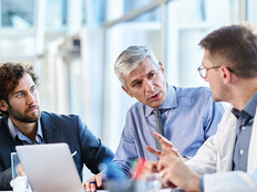 healthcare team have discussion around table