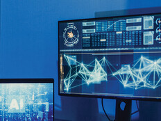 developer works on AI algorithm on multiple monitors