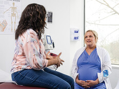 doctor focuses on patient during appointment
