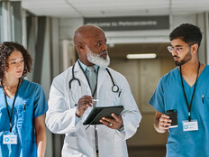 Doctor and nurses talking