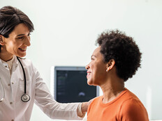 doctor reassures patient