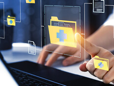 doctor signing into computer folders