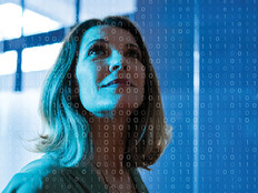 woman looking up at data concept