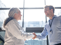 two people shaking hands