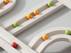 colorful marbles move through white paths