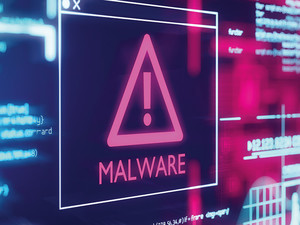 malware alert with computer code background