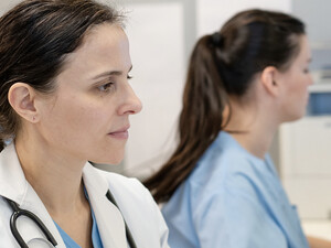 Doctors using computers in a hospital