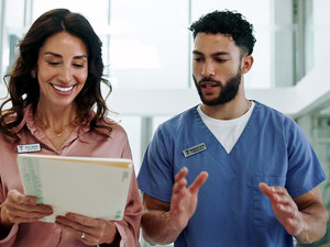 Hospital chief, teamwork and planning with doctor