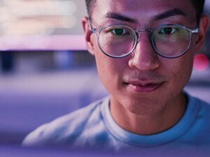 IT expert looks at monitor