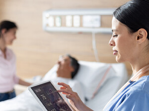 Doctor using tablet