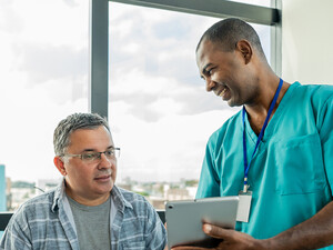 Doctor speaking with patient