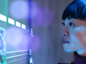Person working with a futuristic computer