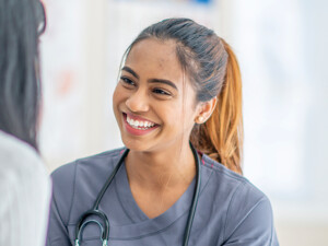 nurse smiling at patient