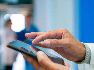 Doctor using tablet