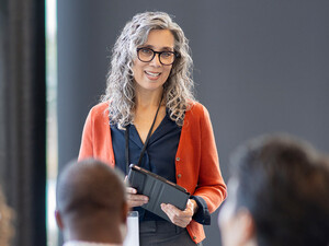 Person presenting at conference