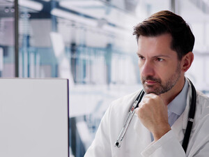 Doctor using computer