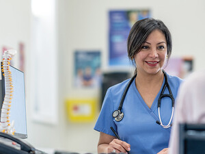 nurse talks to patient