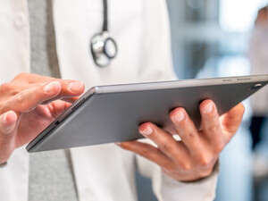Doctor using tablet
