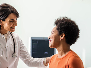 doctor reassures patient