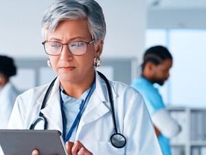 Doctor using tablet