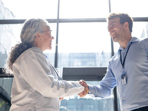 two people shaking hands