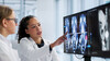 doctors look at brain scan
