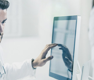 Doctor using computer in hospital