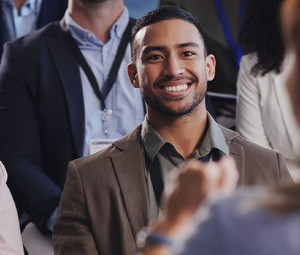 People listening to a conference