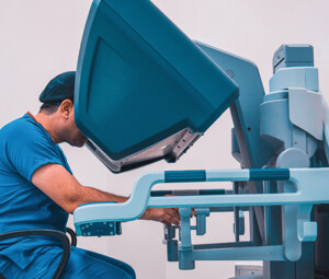 doctor performs telerobotic surgery