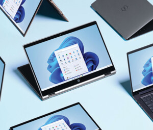 Several laptops with Windows 11 branding