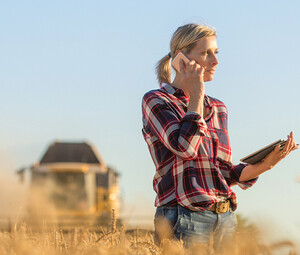 Person in rural setting talking on phone