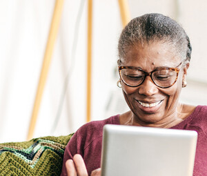 Older person using tablet