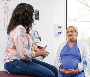 doctor focuses on patient during appointment
